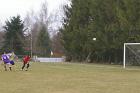 fc pionsat st hilaire beautiful high ball into the sauret besserve penalty area lobs the keeper 2-1 french football foot francais puy de dome league division 3 ligue trois 1 mars march 2009 copyright free photo royalty free photo